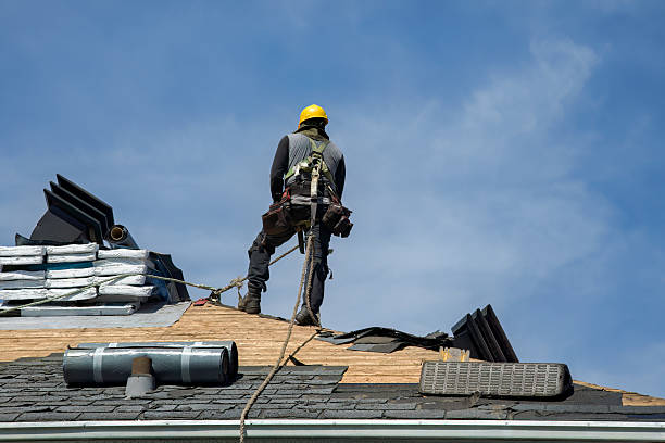 Professional Roofing technician working in North Uxbridge, MA
